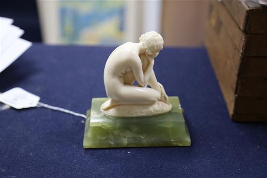 Ferdinand Preiss. An Art Deco carved ivory figure of a crouching female nude, height 5in.